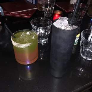 two cocktails on a table