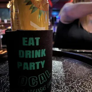 a can of beer on a table