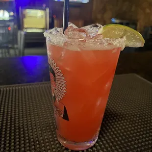 a drink with a slice of lemon