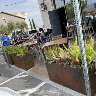 a man riding a bicycle down a street