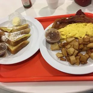 two plates of breakfast food