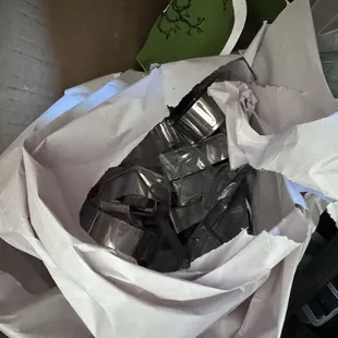 More breakable items thrown in a box