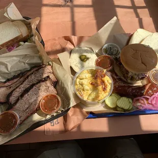 two trays of food on a table