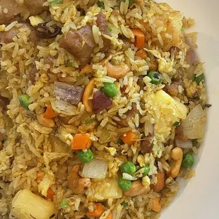 Tropical Fried Rice...curry fried rice with cashew, raisins, egg, onions, peas, shrimp and chicken.