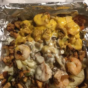Stuffed potato with chicken and shrimp...Mmmm