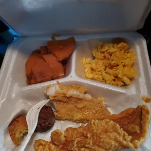 catfish dinner with hushpuppies, yams, mac-n-cheese