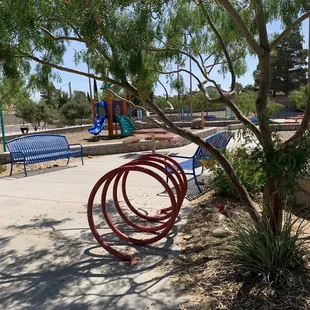 Bike rack, benches and toddler playground