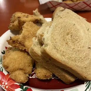 HALF of a fish sandwich for 2