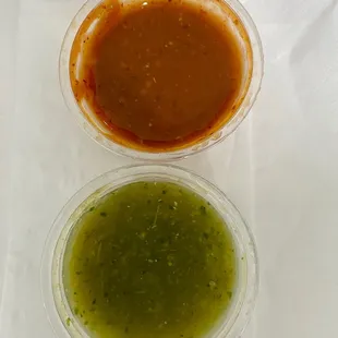 $0.65 cents for each salsa. You get ONE FREE salsa per burrito, then each additional is $0.65 cents. Red is spicy, green is not.
