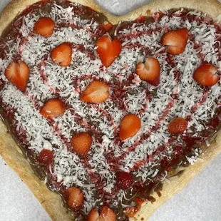 a heart shaped pizza