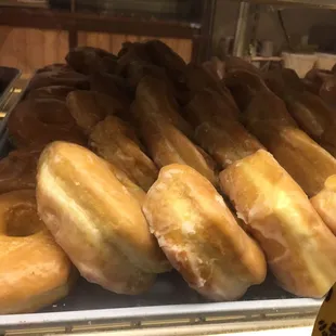 a display of glazed donuts