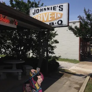 Sign outside Johnnie's Drive-In BBQ, super close to Elvis hometown tour.