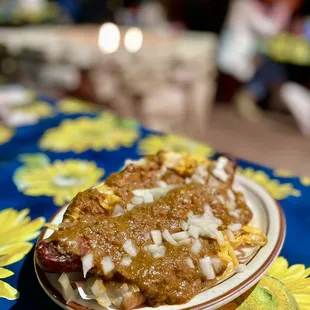 a person holding a plate of food