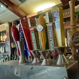 a row of beer taps