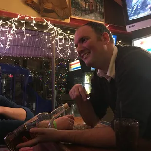 a man sitting at a bar