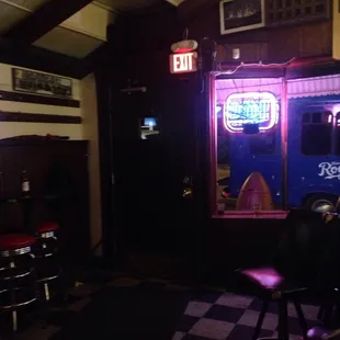 a neon sign in the window