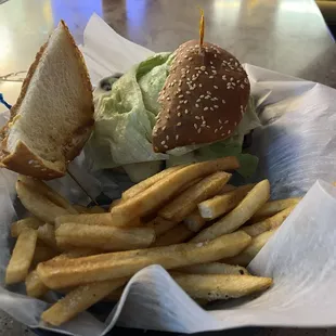 Johnie&apos;s burger with Swiss and fries.