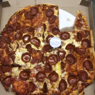 a pepperoni pizza in a box
