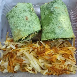 Garden burrito w hashbrowns .