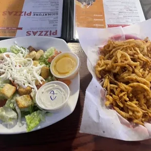 Rings and a salad with creamy parm.