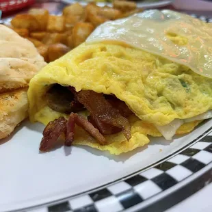 Closeup: Popeye's Omelet with biscuits &amp; potatoes
