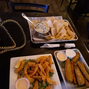 Calamari was not rubbery what so ever. Fried pickles aren&apos;t over done, and spin dip had good texture.