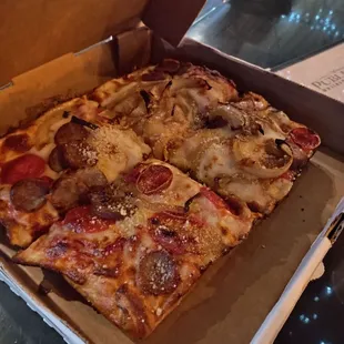 My pizza to go. Half off on Mondays my favorite rn sausage, pepperoni and sweet onions.