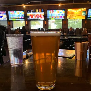 A tall beer and a lot of TVs. I think I'm going to like this place.