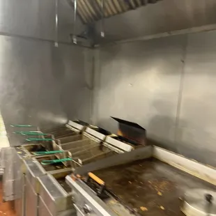A horrid looking fryer station.