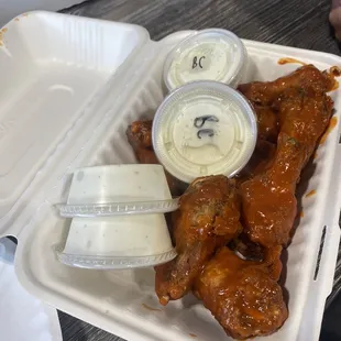 Mild Buffalo wings! Wings are small but good flavoring and texture! Plenty of dipping sauce!