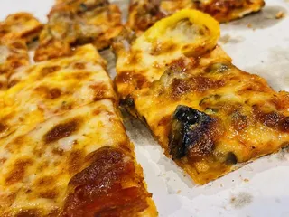 Ricardo's Pub Pizza