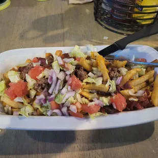 Super dry, barely any cheese. And bland.  Loaded burger fries