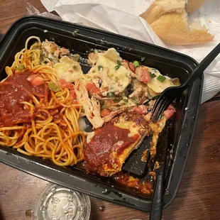 Johnny's Combo Of Classic Chicken Parmesan and Grilled Chicken Jalapeño Ravioli you get a side of spaghetti with Chicken Parmesan