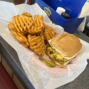 Cheeseburger and waffle fries!