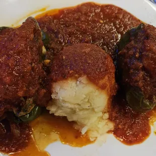 Stuffed green peppers with mashed tomatoes