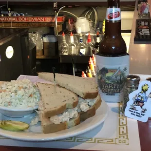 a sandwich and coleslaw