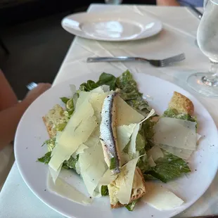 One half of a Caesar Salad