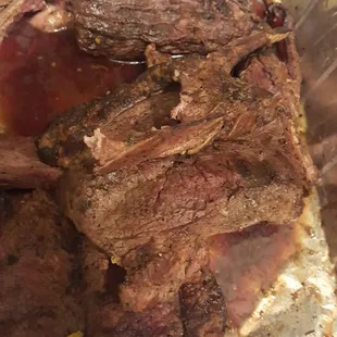 a piece of meat wrapped in tin foil