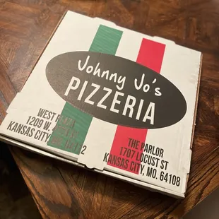 a pizza box on a table