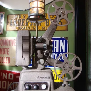 Antique film projector converted to a lamp.