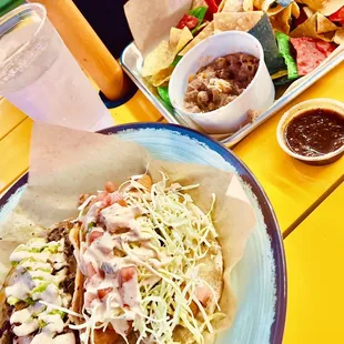 Surf and turf taco, crispy fish taco, salsa and dip sampler.