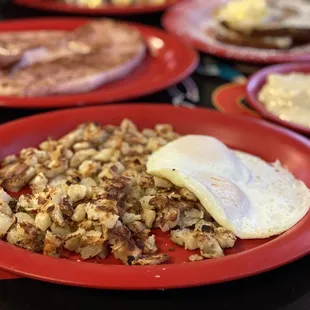 2 Eggs, Potatoes, Ham Steak, and Biscuits and Gravy.