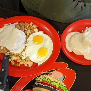 Country fried steak with biscuit and gravy