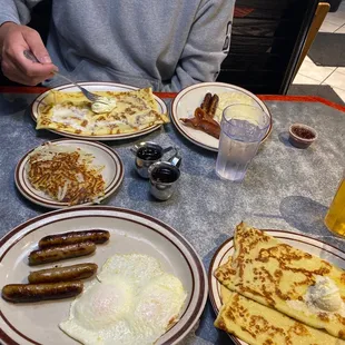 a table full of breakfast foods