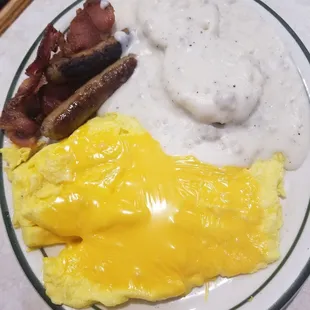 The Southerner- 1 biscuits and gravy, 2 eggs(anyway you like. I put cheese on mine), and your choice of bacon, sausage links, or both.