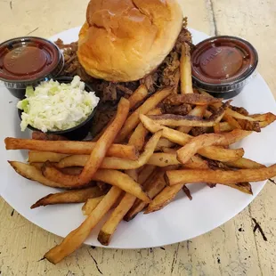 Chopped brisket sandwich, slaw &amp; fries
