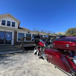 a red motorcycle parked outside