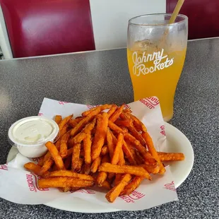 Drink with sweet potatoes fries and ranch dressing.The drink was not theirs but one I brought in.