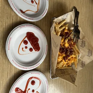 three plates of food on a table