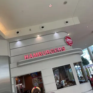 the entrance to a hamburger restaurant